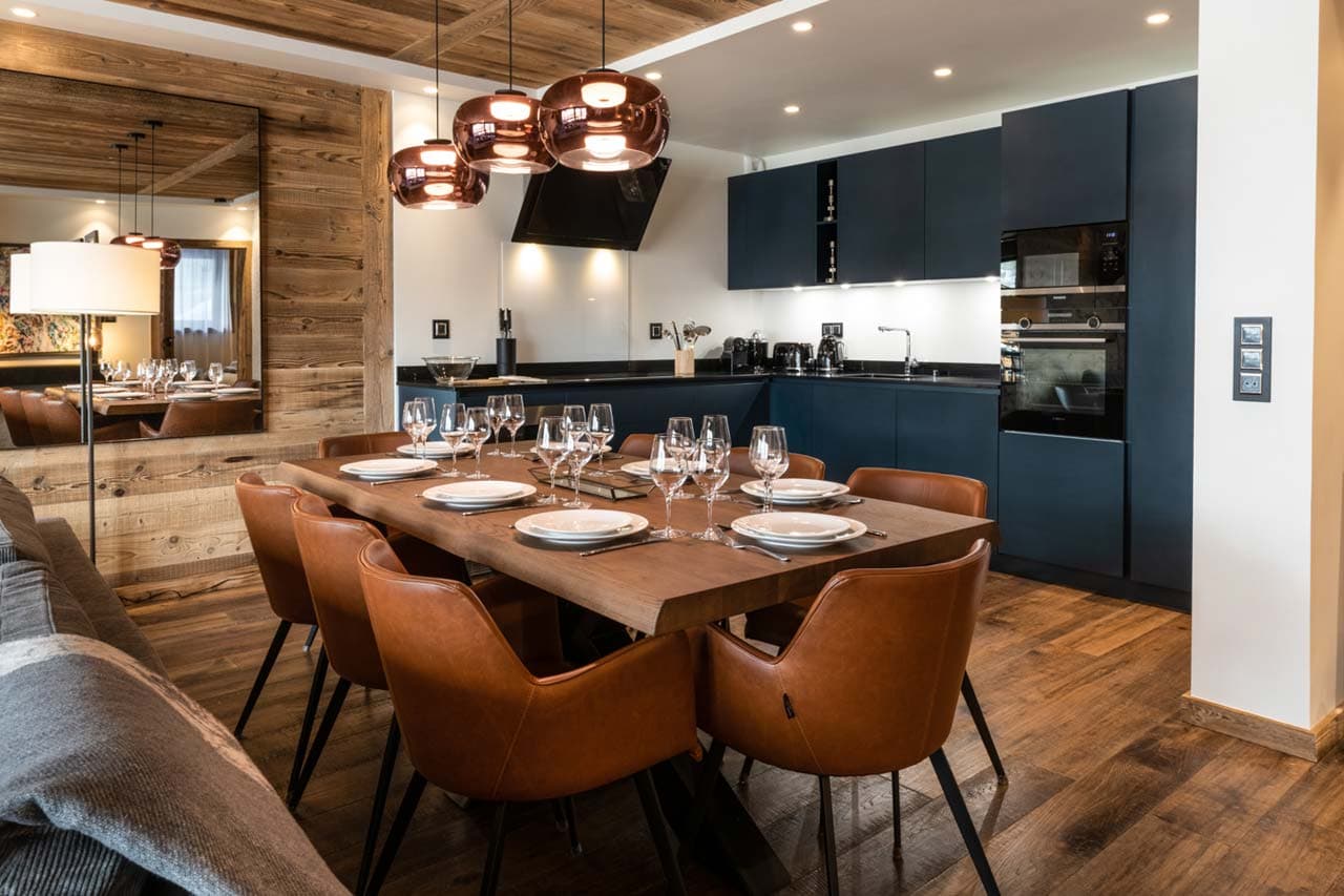 Dining area and open-plan kitchen of Alaska Lodge 3 in Val d'Isere