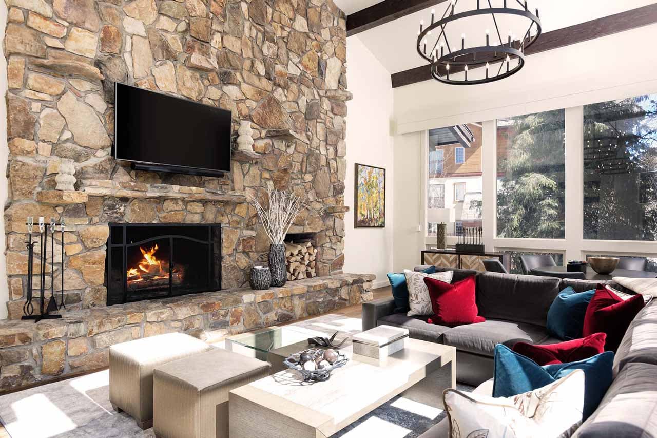 Fireplace in living room of Avanti Chalet in Vail