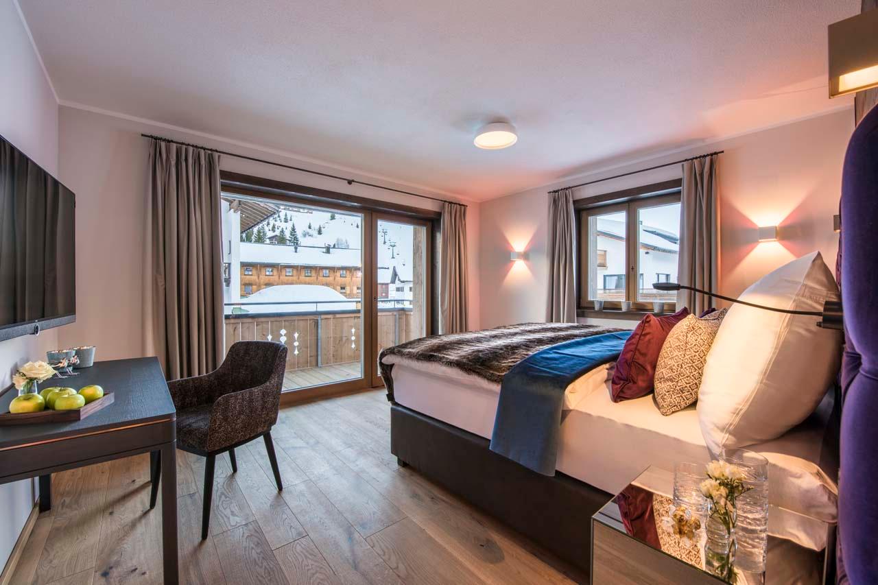 Master bedroom balcony at Exterior of Balegia Apartment 3 in Lech