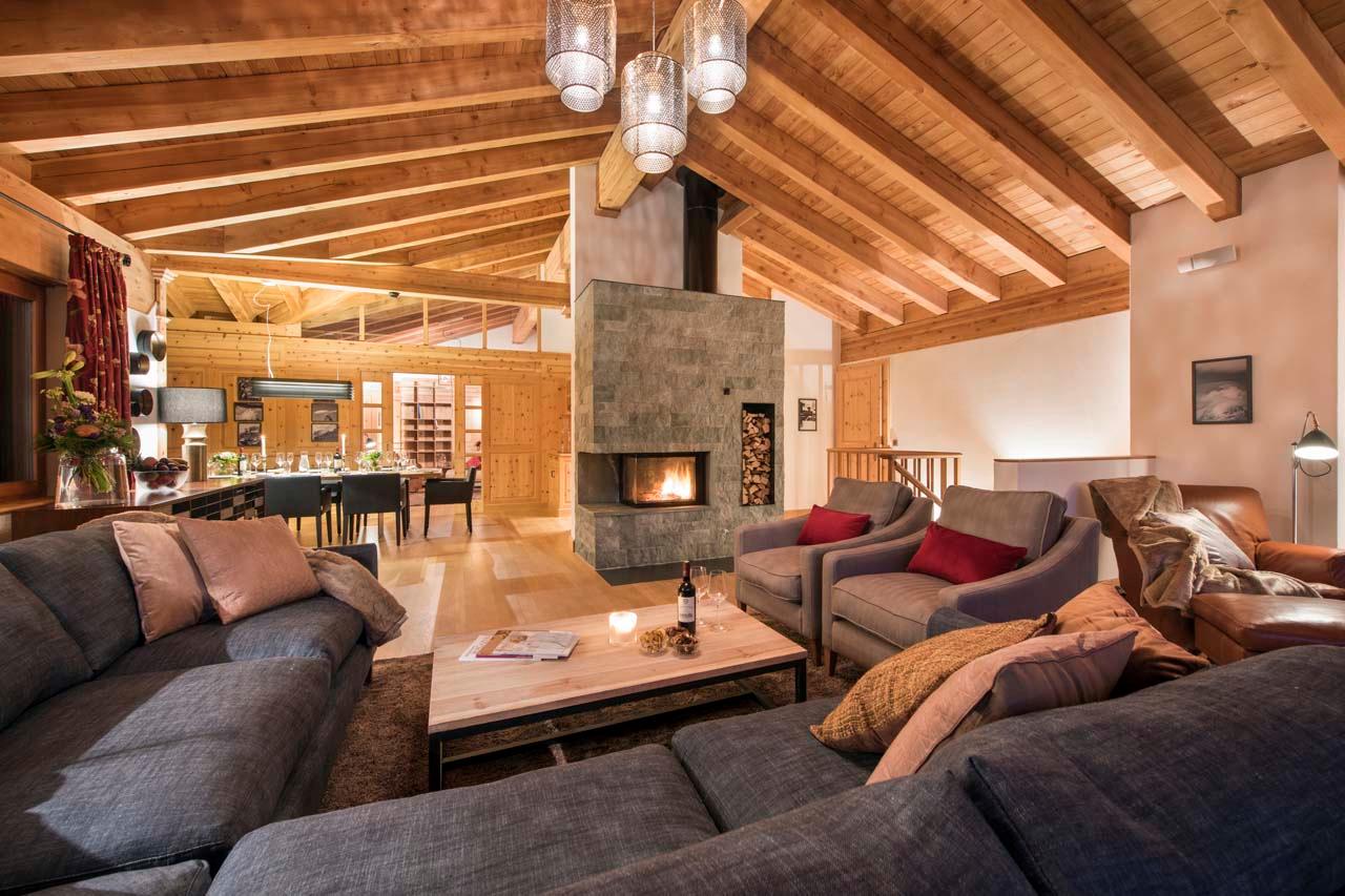 Living area at night in Chalet Alex in Zermatt