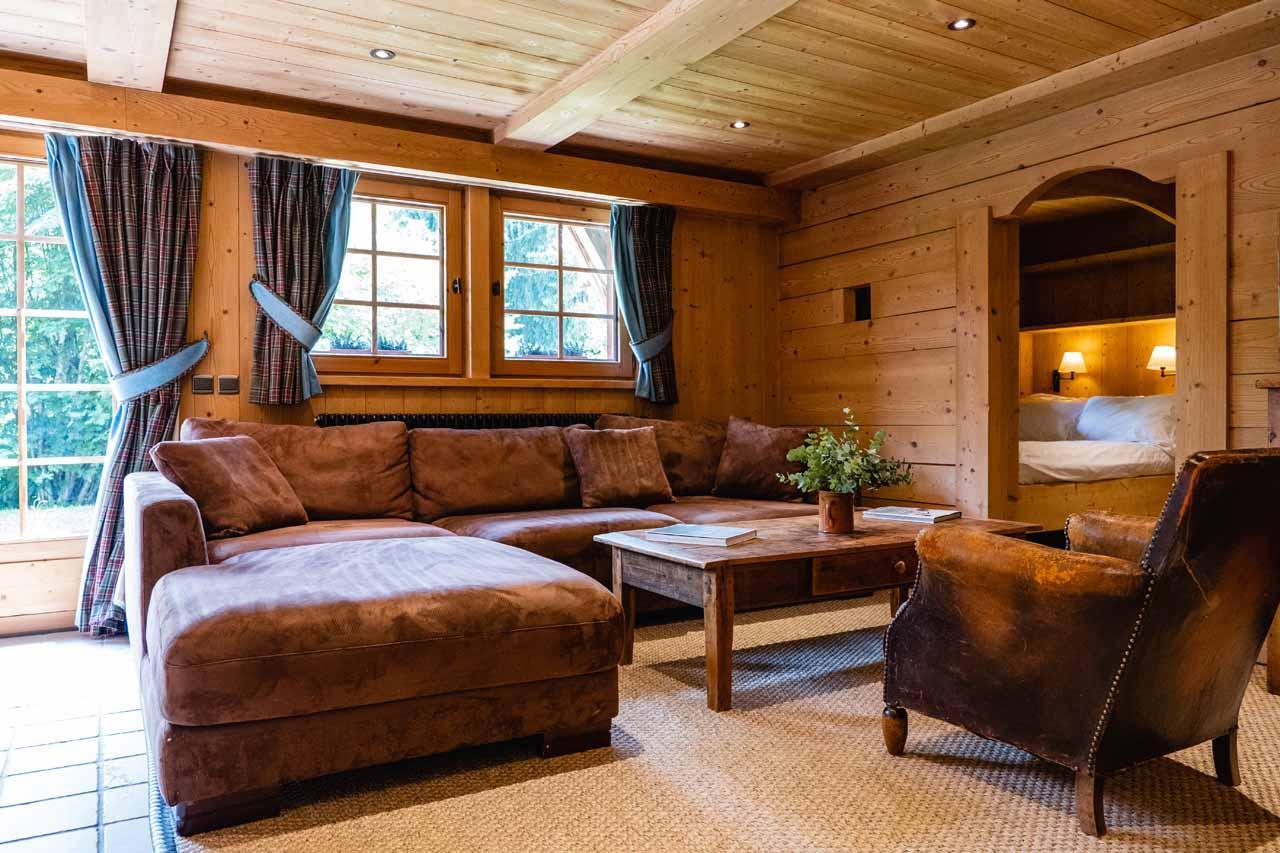 Small living area and entrance to alcove bedroom in Chalet Ambroise, Megeve