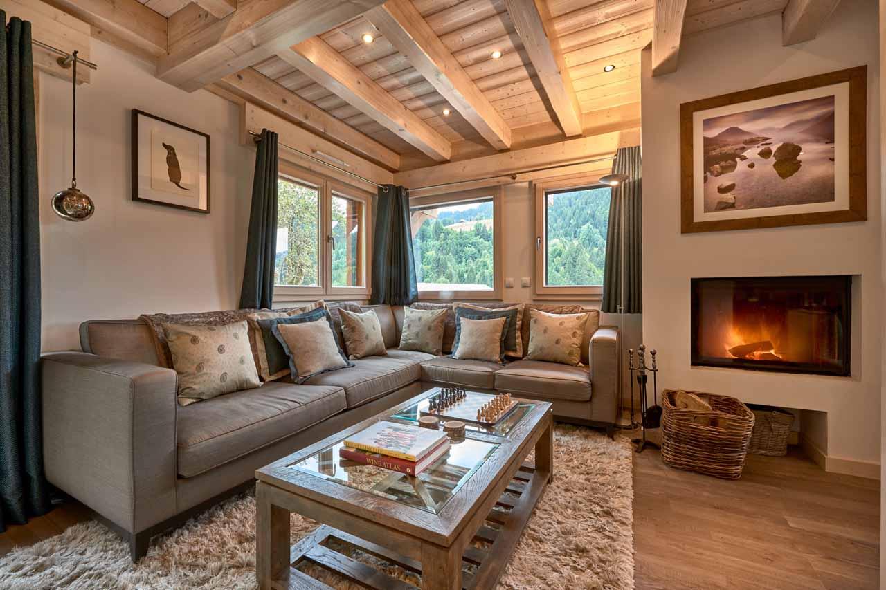Fireplace in living area at Chalet Aubois in Morzine