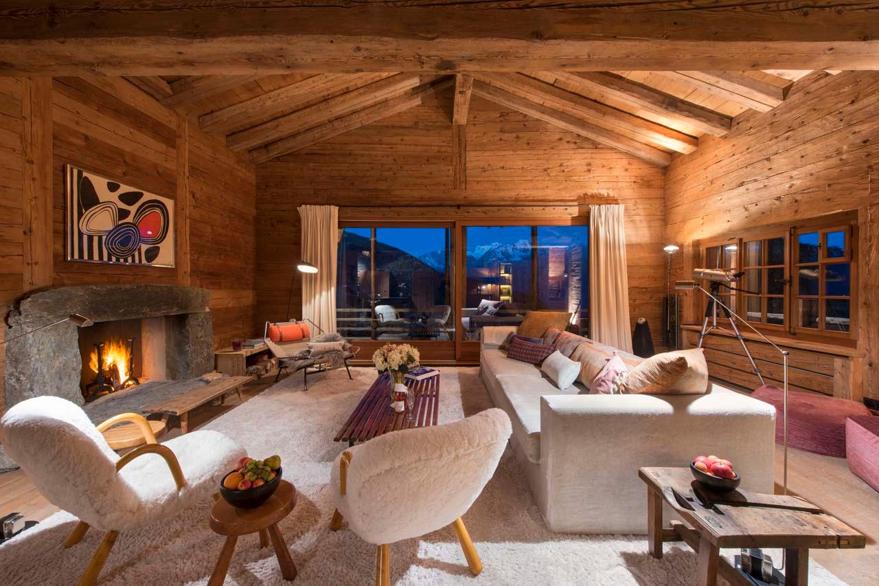 Living area with fireplace at Chalet Bibi in Verbier