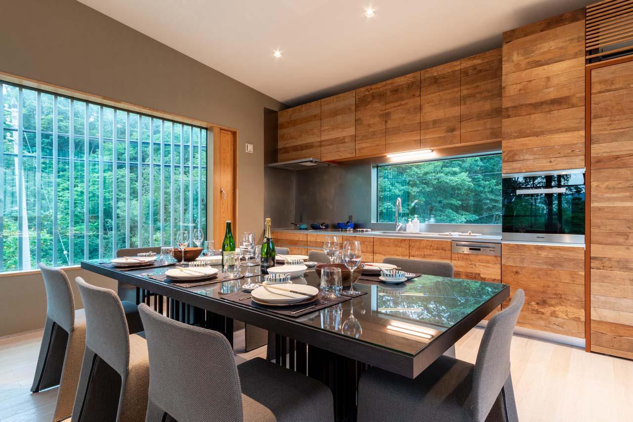 Dining and kitchen area at Chalet Boheme in Niseko