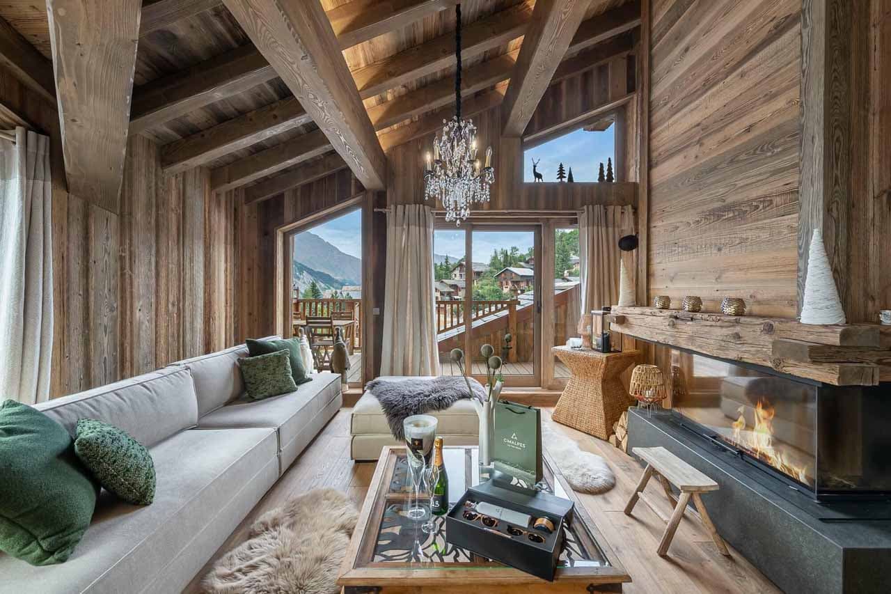 Fireplace in living area of Chalet Coco Marcel in St Martin de Belleville