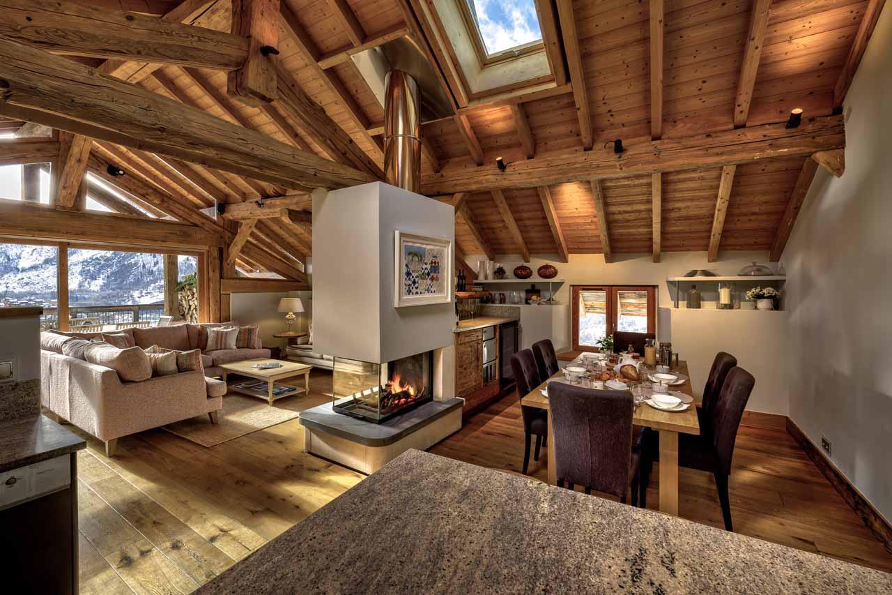 Spacious living area with double height ceilings at Chalet Coco in St Martin De Belleville