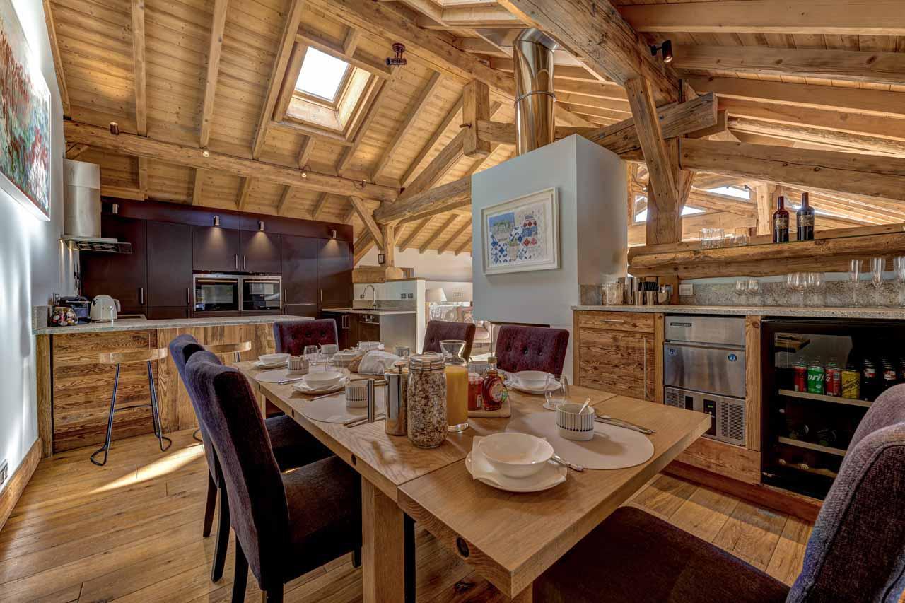Dining table with space to accommodate 10 guests at Chalet Coco in St Martin De Belleville