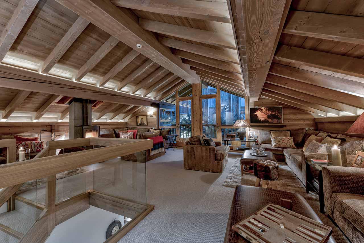 Spacious living room with spectacular views of the Alpsat Chalet Floralie in St Martin de Belleville