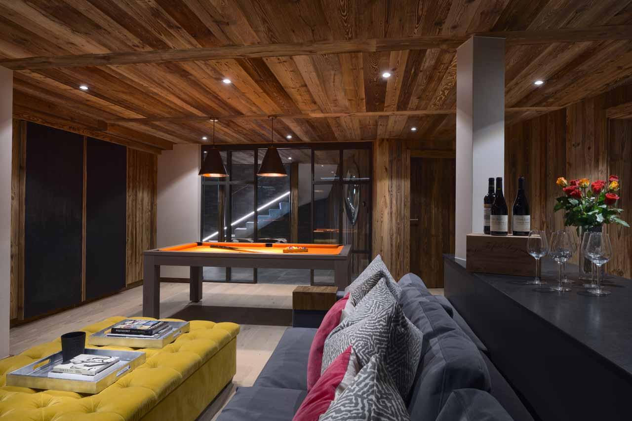 TV area and pool table at Chalet Genepi in Morzine