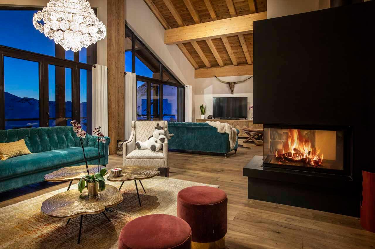 Fireplace in living area of Chalet Golden Jubilee in Val Thorens