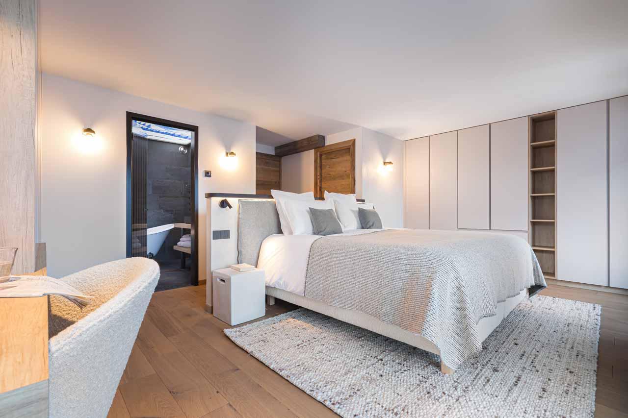 Spacious and elegant bedroom at Chalet Kandahar in Courchevel 1550