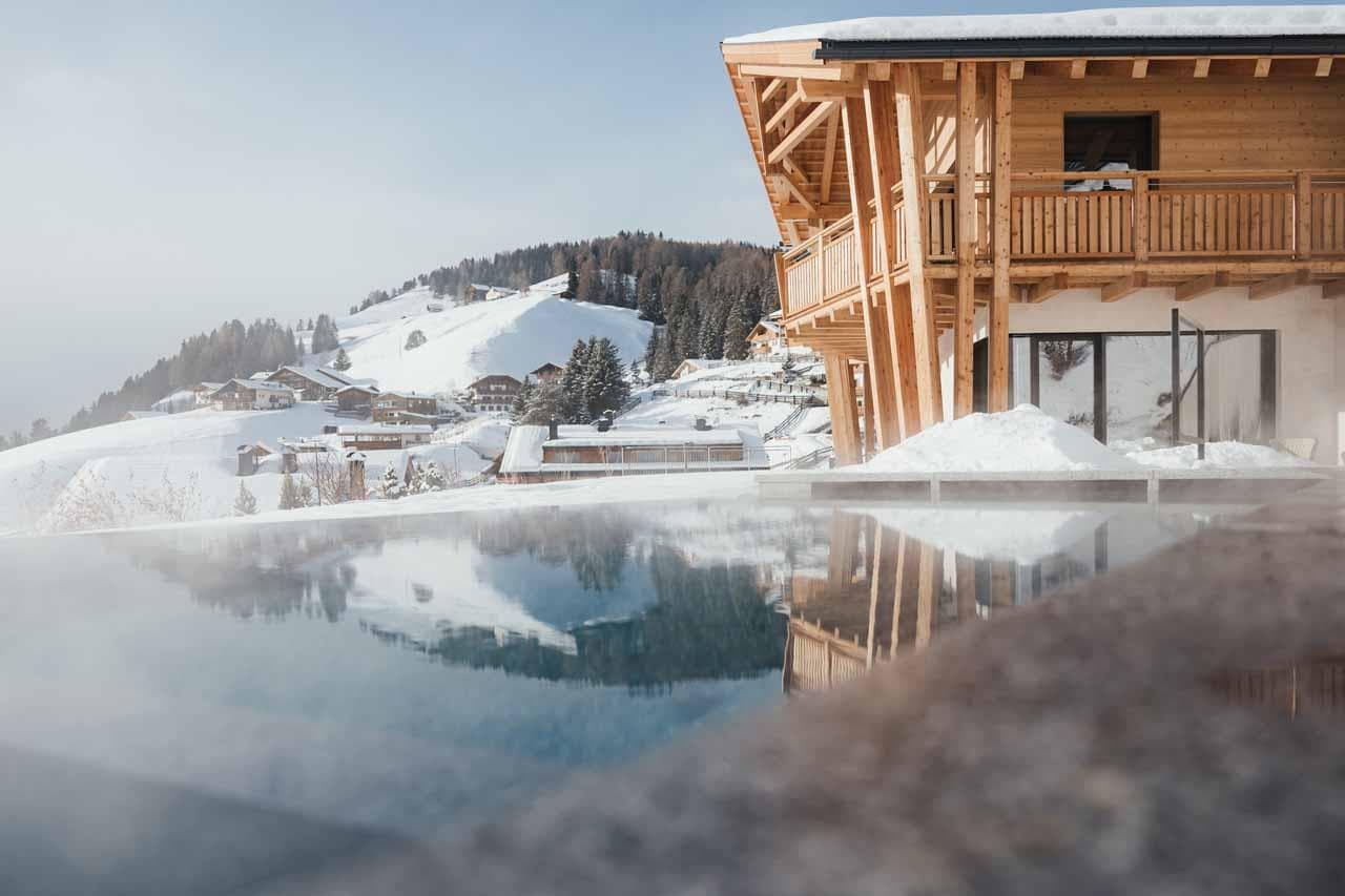 Exterior and pool at Chalet Lum d'Or in Val Gardena