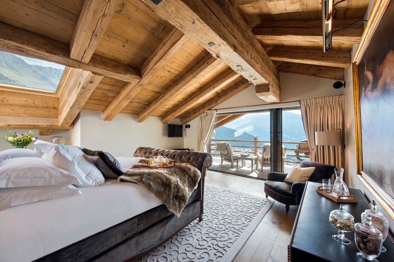 Bedroom one balcony at Alpine Estate in Verbier