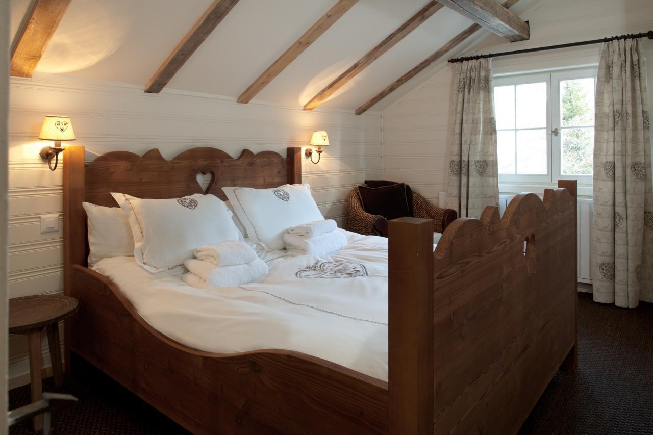 Bedroom one at Silverbirch Chalet in Davos