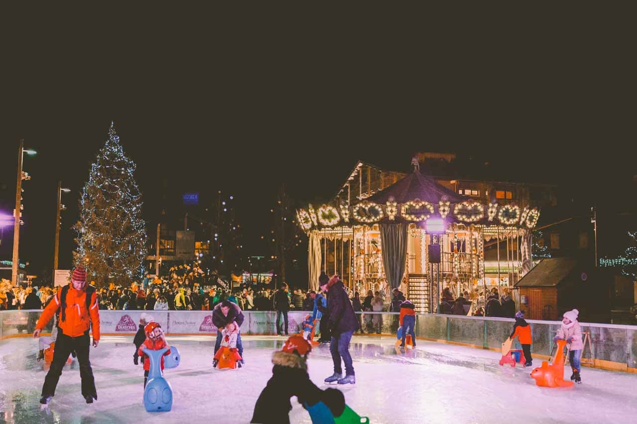 Ice skating on the ice rink in Morzine at night