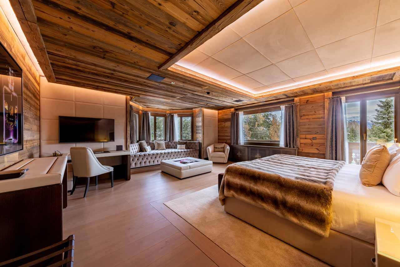 Bedroom three with window seat at  Ultima Crans Montana 1