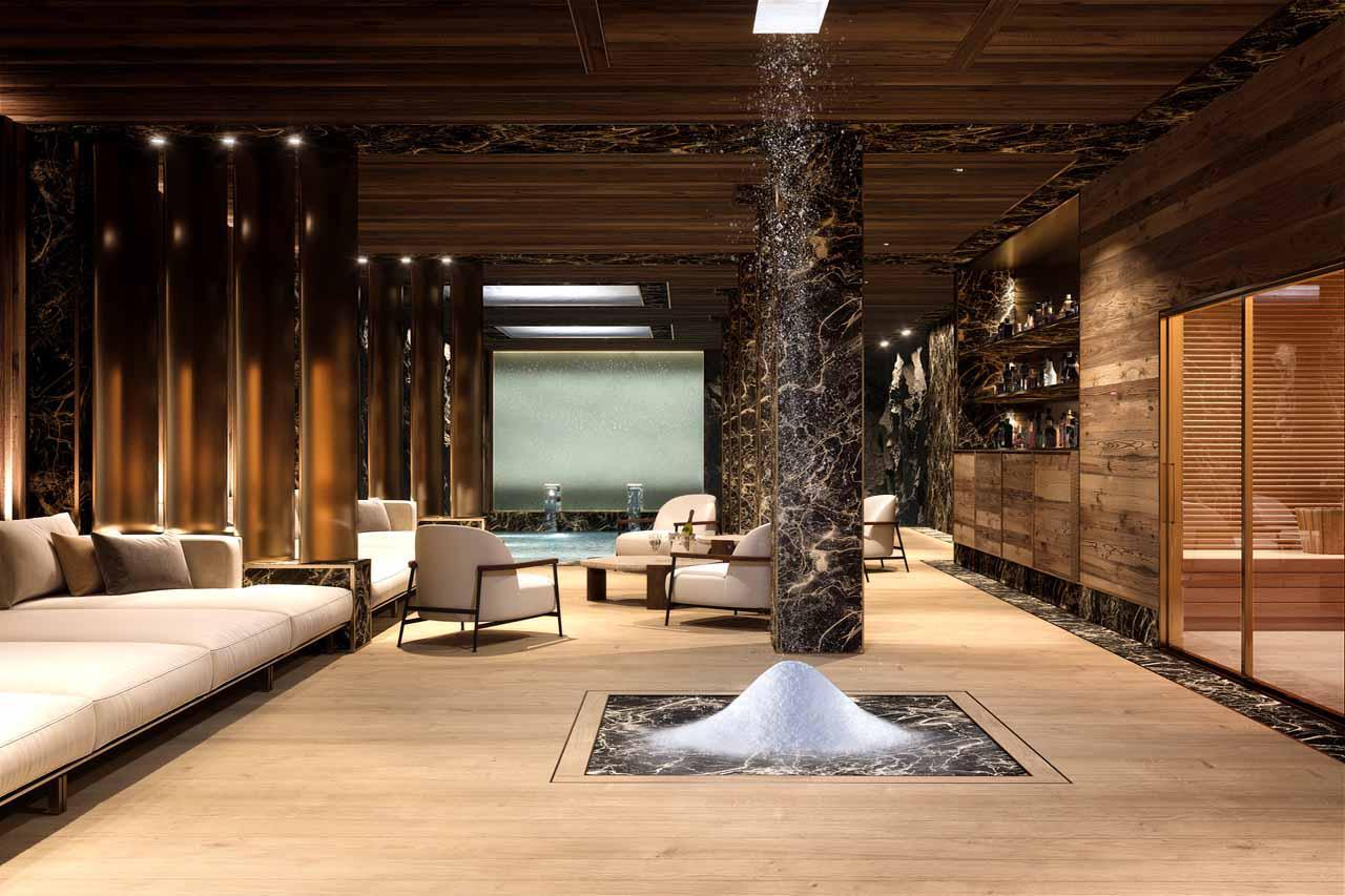 Wellness area with snow shower, seating and pool in Ultima Gstaad Promenade, Gstaad